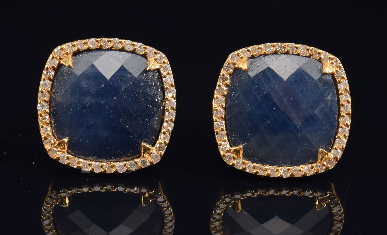 Gurhan 22K gold sapphires and diamond earrings. Faceted square form stones measuring approx. 11.5mm: Gurhan 22K gold sapphires and diamond earrings. Faceted square form stones measuring approx. 11.5mm square. Surrounded by tiny diamonds. Marked on reverse: Gurhan and serial numbers. 7.1 grams. Matchi