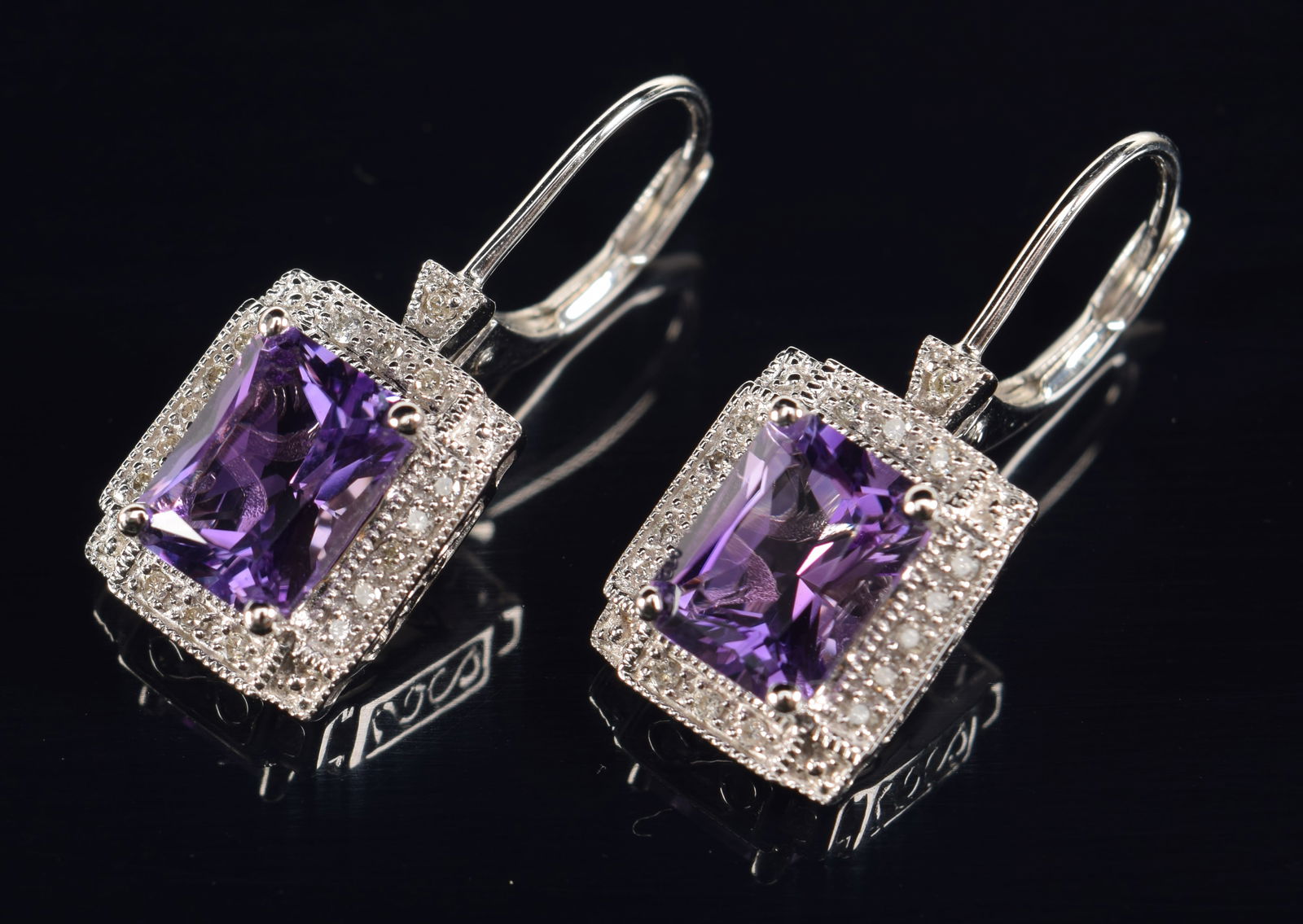 14K white gold amethyst and diamond earrings. Rectangular amethyst stones surrounded by tiny round (1 of 5)