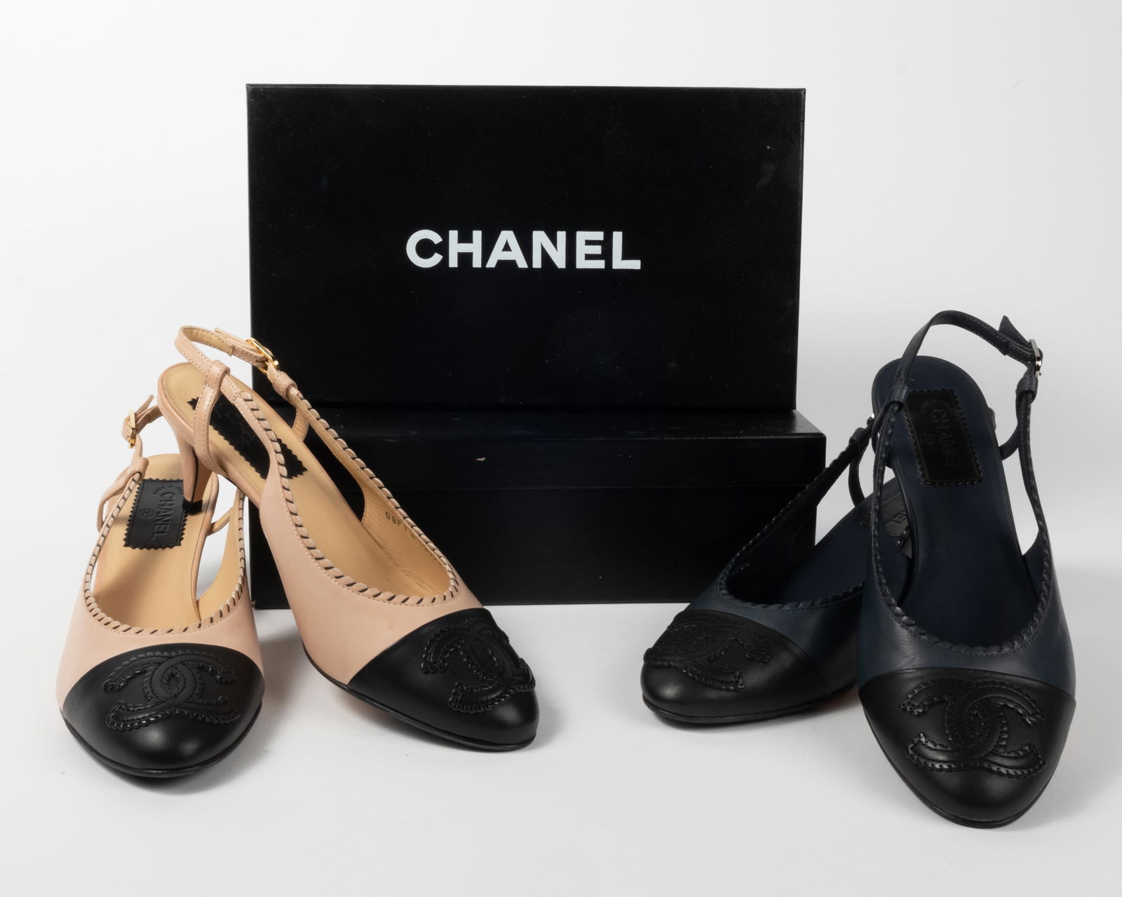 Two pairs Chanel heeled sling back shoes. Both in original boxes with dust bags. (1) Light beige (1 of 12)