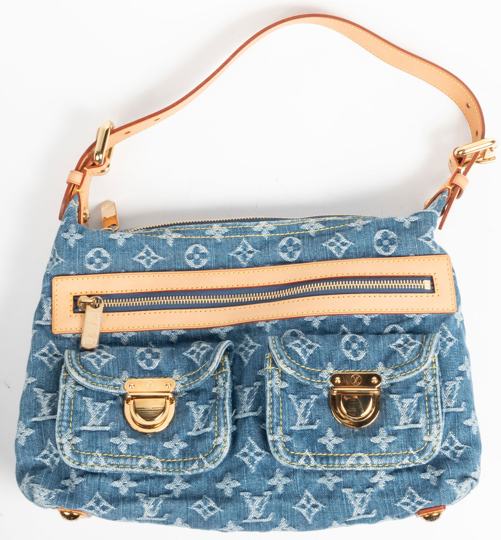 Louis Vuitton denim monogram baggy handbag. Two outside pockets and zipper compartment. Adjustable (1 of 5)