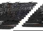 Large Chanel Quilted calfskin leather expandable bag in black color. Wrap around zipper on bottom