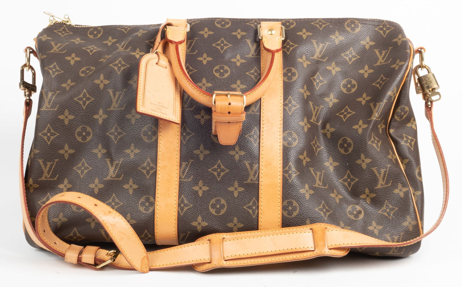 Louis Vuitton keep all Brown canvas interior. Attached id card pouch. Long leather adjustable strap. (1 of 5)