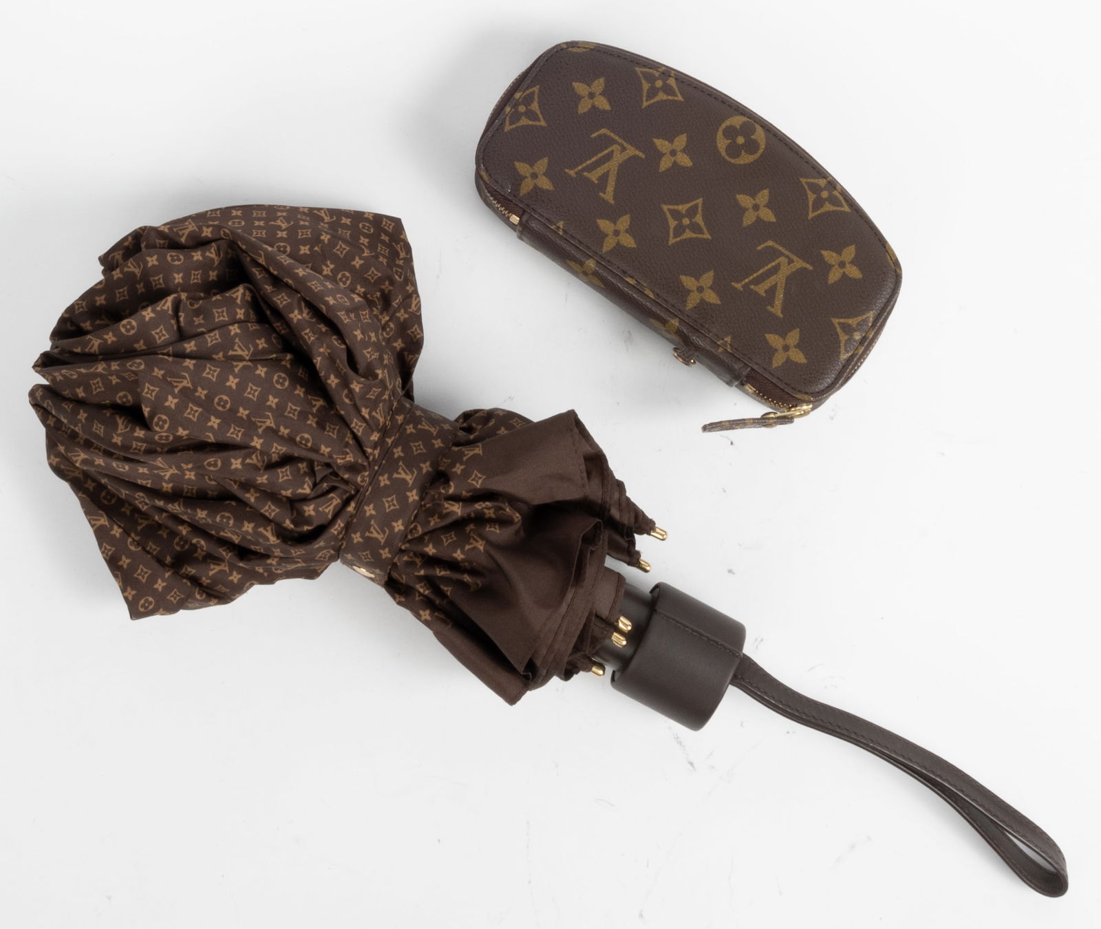 Lot of two. Louis Vuitton umbrella and Louis Vuitton eye glass case. Both in classic Louis Vuitton (1 of 8)