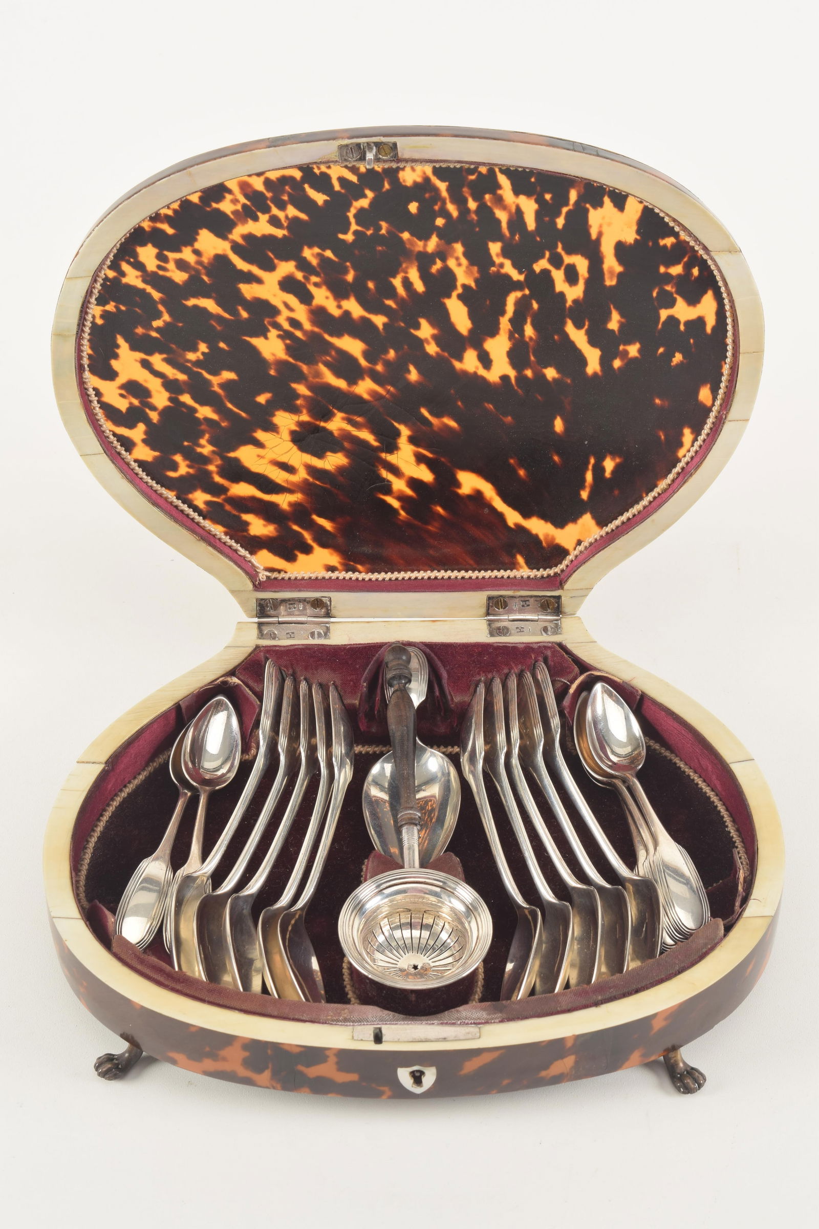 Dutch cased silver teaspoon set with strainer in fitted tortoise shell case. Including 17 pieces, (1 of 7)