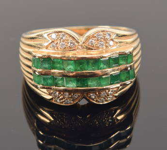 14K gold emerald and diamond ring. 2 channels of square emerald between sections of tiny round: 14K gold emerald and diamond ring. 2 channels of square emerald between sections of tiny round diamonds. Marked 14KP. Ring size 6.75. 8 grams.