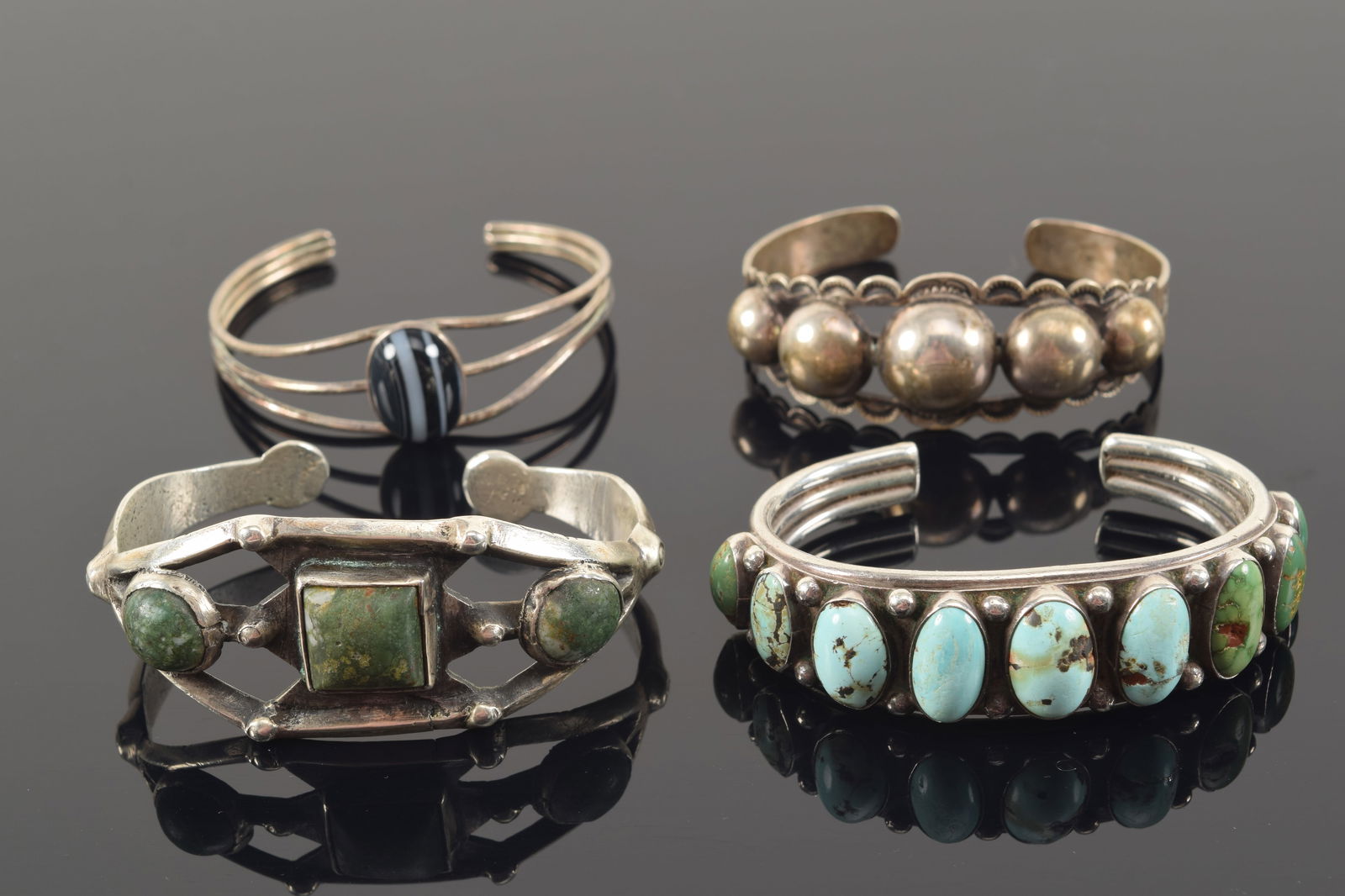 4 southwestern style silver cuff bracelets. Turquoise and other stone mounted. Unmarked. 3in wide (1 of 8)