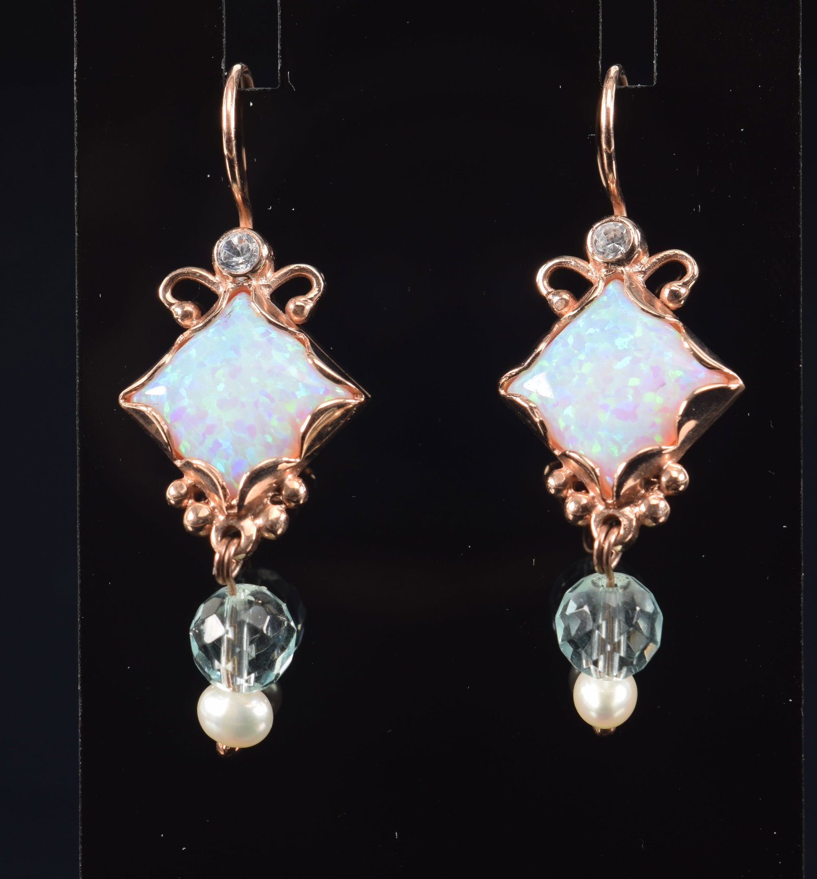 14K rose gold opal and diamond earrings. Square form opals with 2.2mm round diamonds. Seed pearl and (1 of 4)