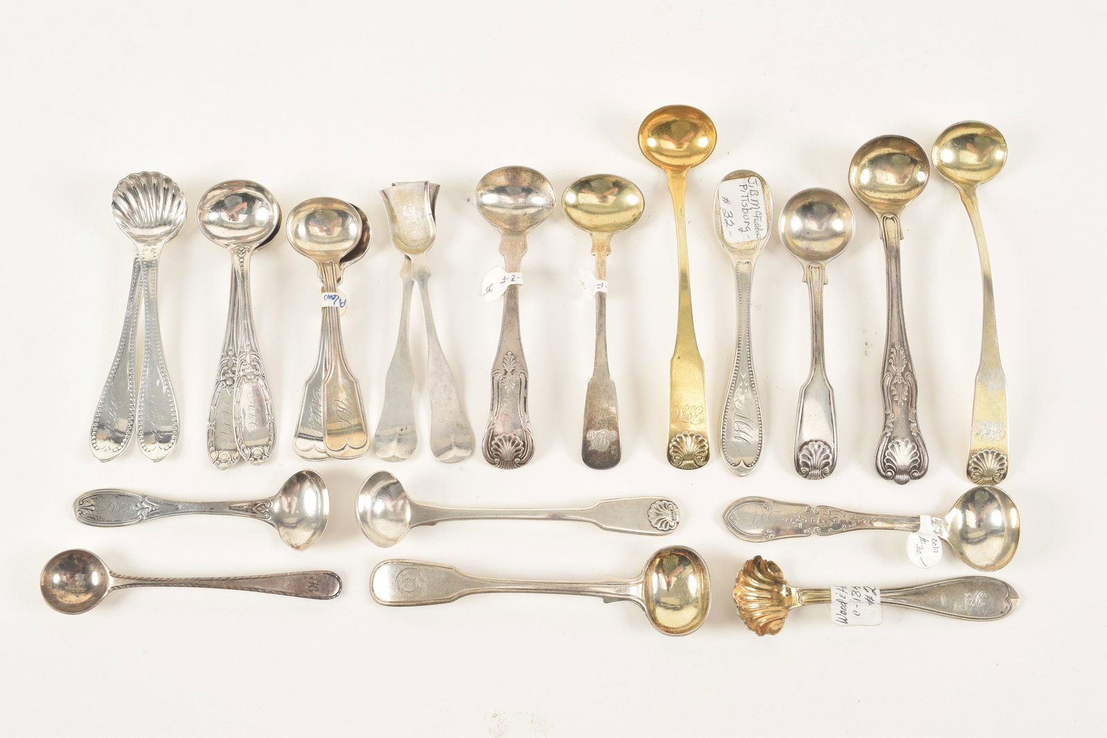 21 British silver fine salt spoons many with shell ends, mostly 19th Century sterling. 7.7 ozt. (1 of 6)