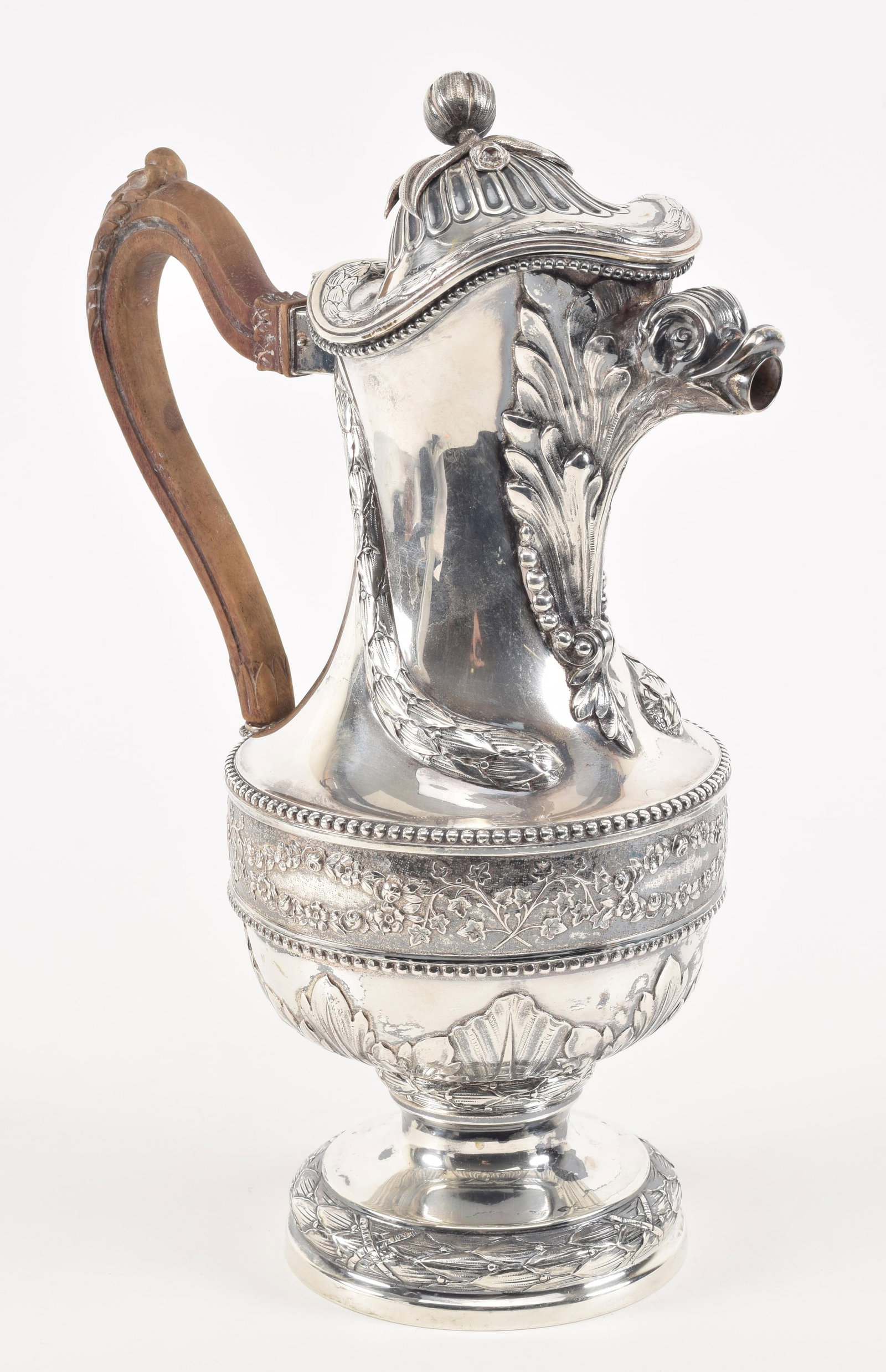 Dutch ornate heavy silver water pitcher. Figural spout supported by relief acanthus leaf decoration. (1 of 9)
