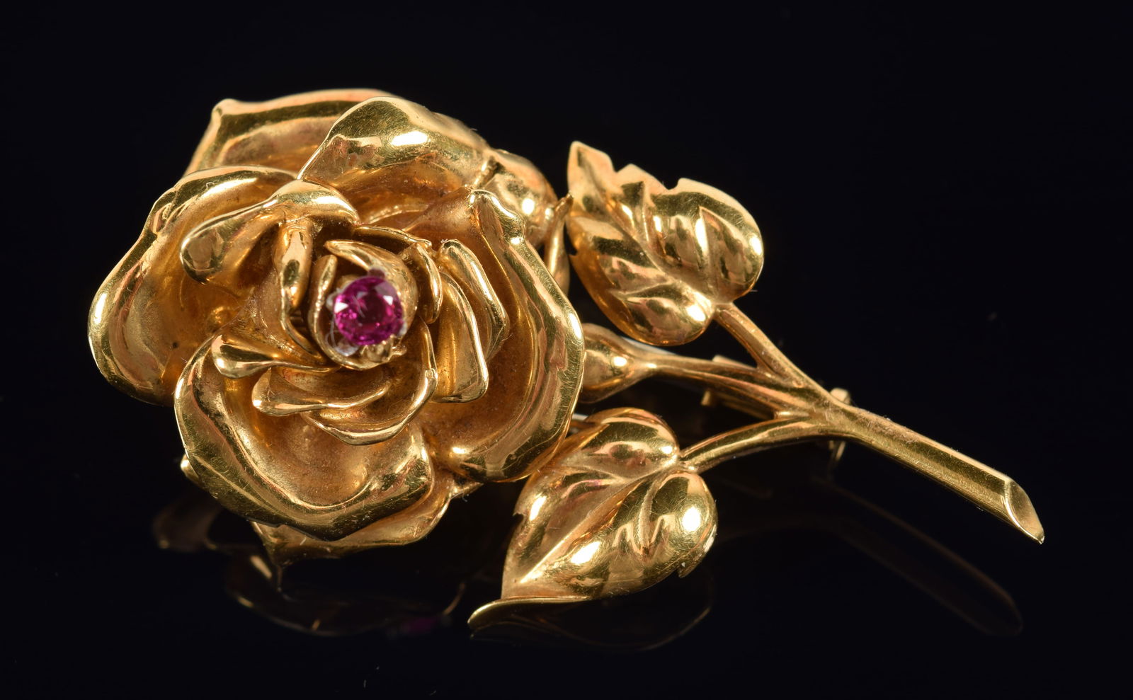 Cartier 18K gold flower form pin with ruby center stone. Marked 18K, 750, Swiss made, and Cartier (1 of 14)