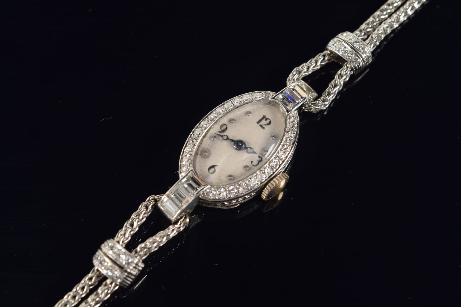 Vintage Hamilton platinum diamond mounted ladies wristwatch. Watch face set with round diamonds on (1 of 4)