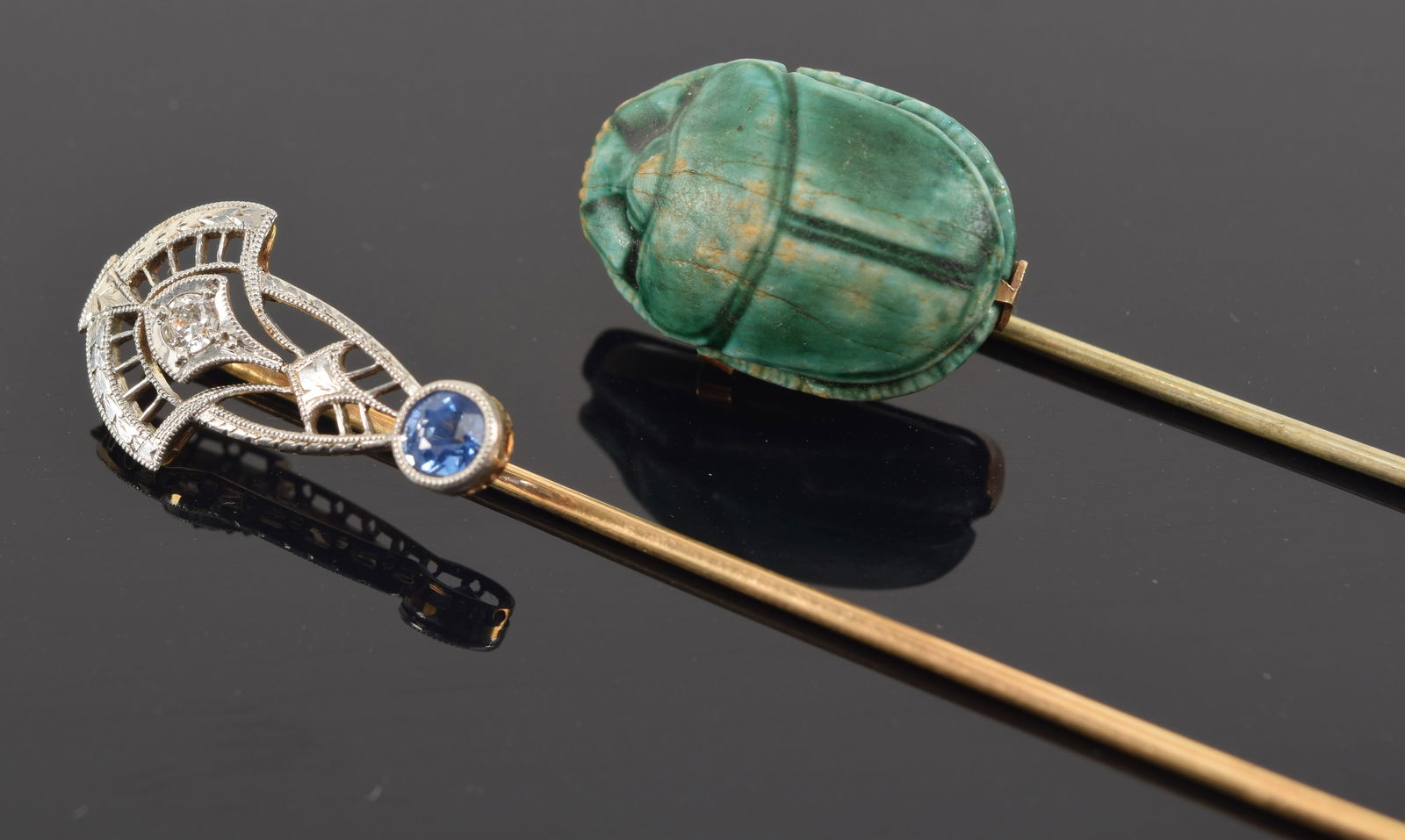 2 stick pins. 1) 14K gold pin with sapphire and diamond. Stones in a white gold filigree setting. (1 of 4)