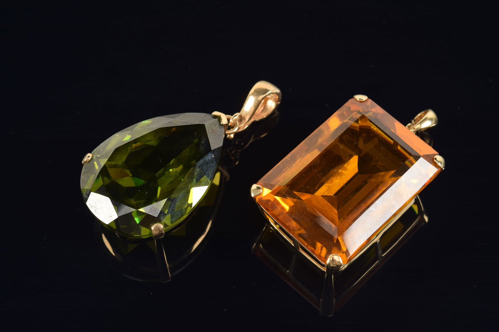 2 Large 14K gold pendants. 1) Rectangular topaz of a yellow-orange color. Measures 25 x 35mm. (1 of 6)