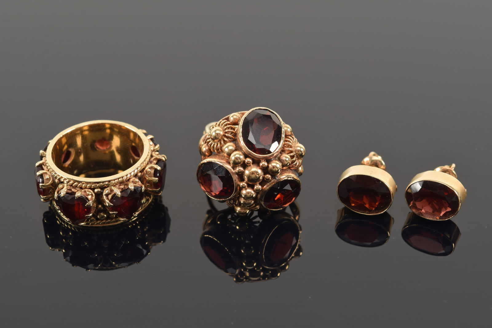 14K gold garnet jewelry. To include: 1) Renaissance style beadwork decoration ring set with 3 oval (1 of 6)