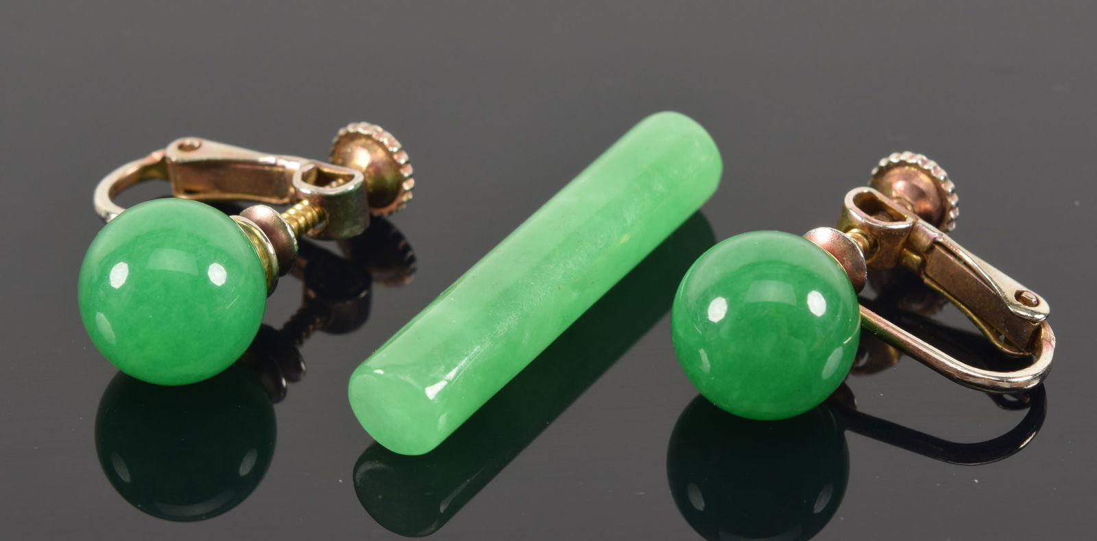 3 pieces of jade jewelry. Pair of apple green jadeite bead earrings. Beads approx. 10mm diameter. (1 of 2)