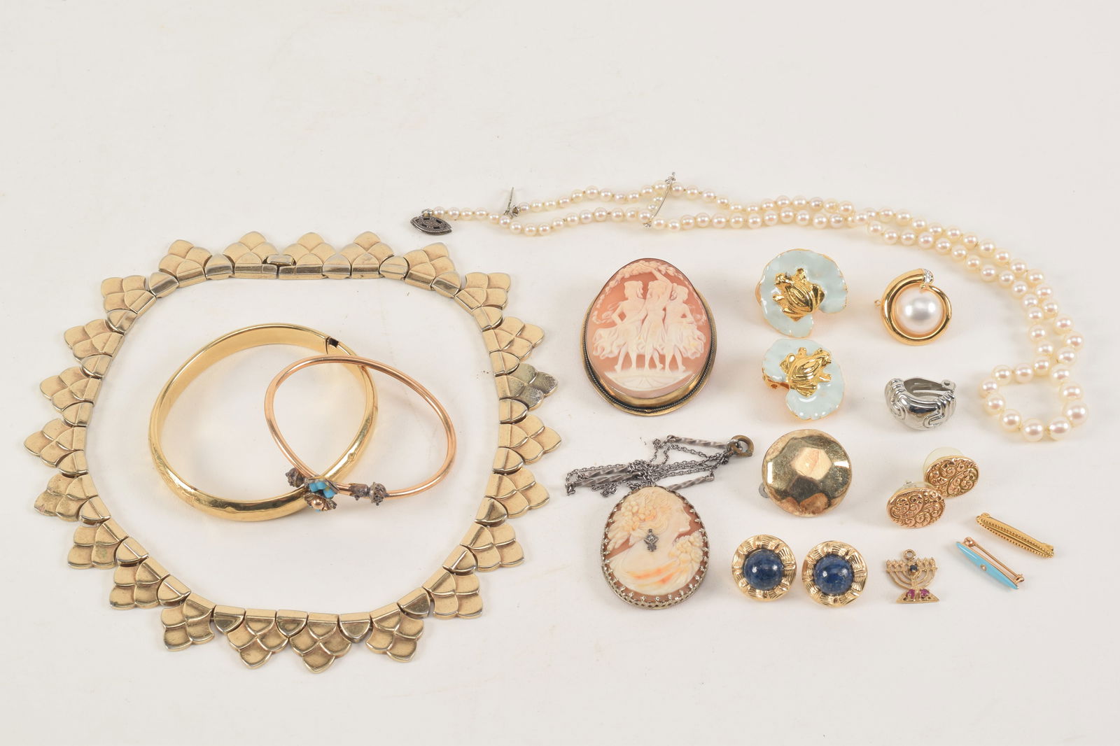 Collection of jewelry including vintage gold bar pins, pearl necklace, gold cameo pin, and more. (1 of 5)