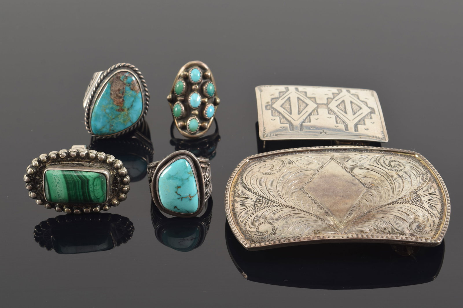 Lot of southwest silver jewelry. To include: 3 turquoise mounted rings (one marked L. Henderson), 1 (1 of 7)