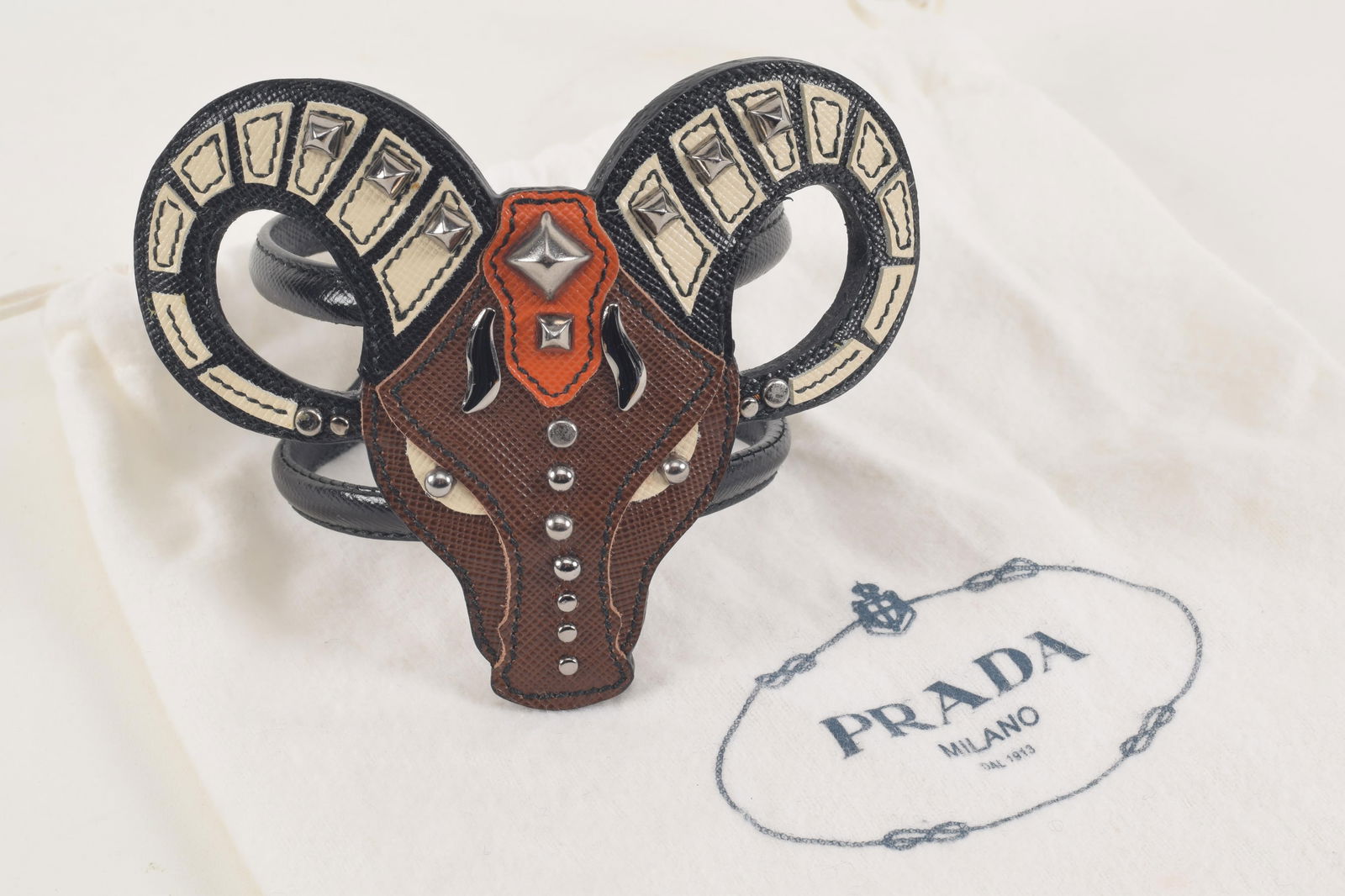 Prada studded leather ram's head bracelet. Marked Prada. Includes dust bag. 4.5in wide. (1 of 3)