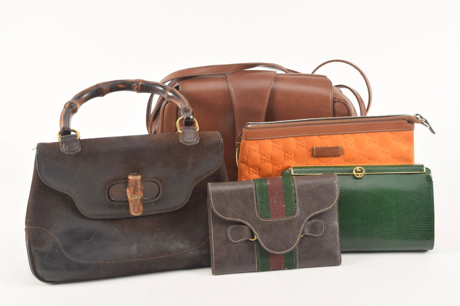 Lot of 5 vintage Gucci handbags and clutches. 1) Green lizard strapless clutch with gold metal Gucci (1 of 12)