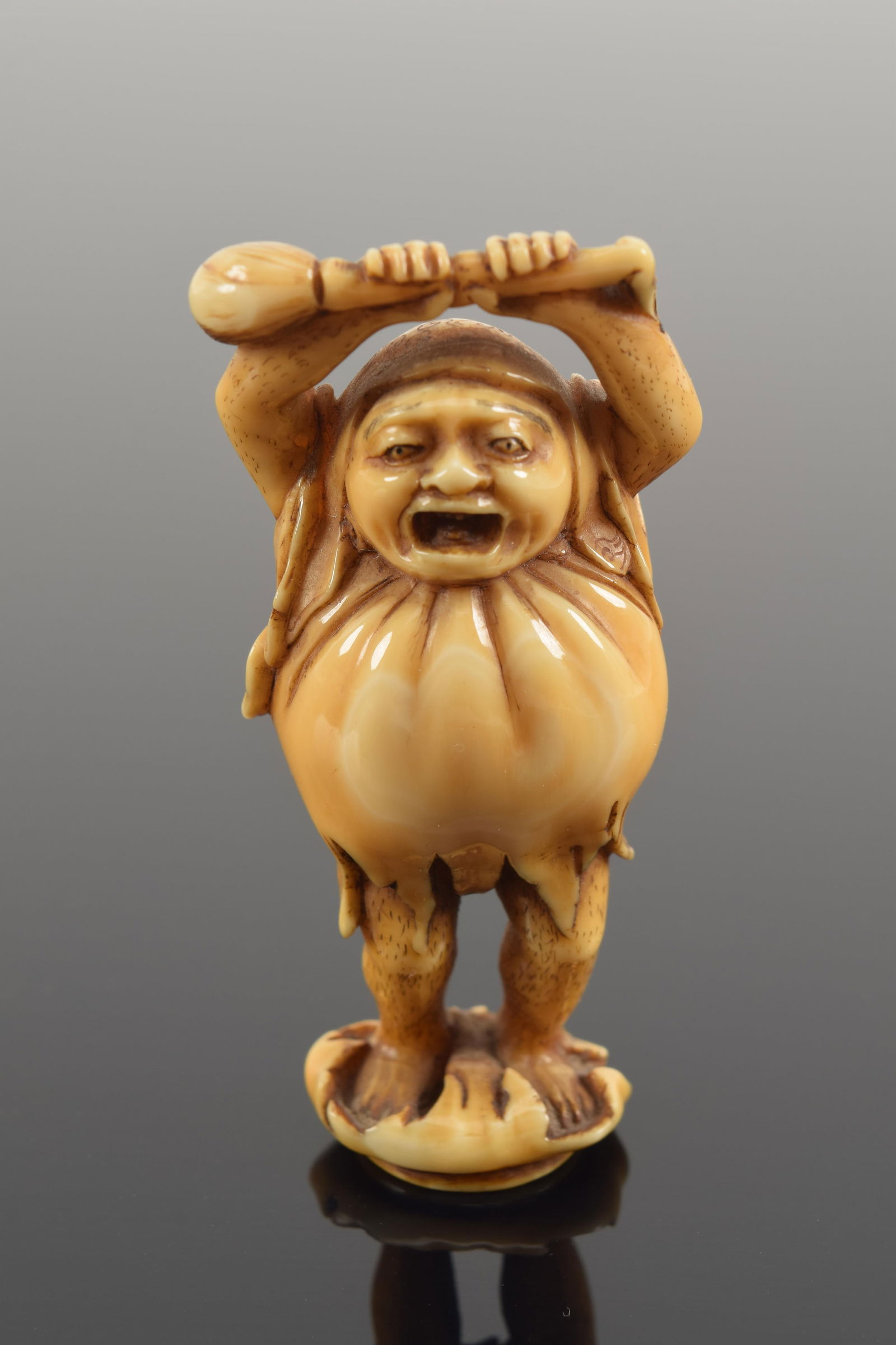 Netsuke. Japan. 19th century. Shunzan. Daruma awakening from his long meditation. 5.7cm. (1 of 5)