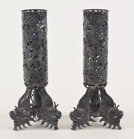 Pair of Chinese export silver vases. 19th century. Fish shaped feet, vase with repousse dragons and