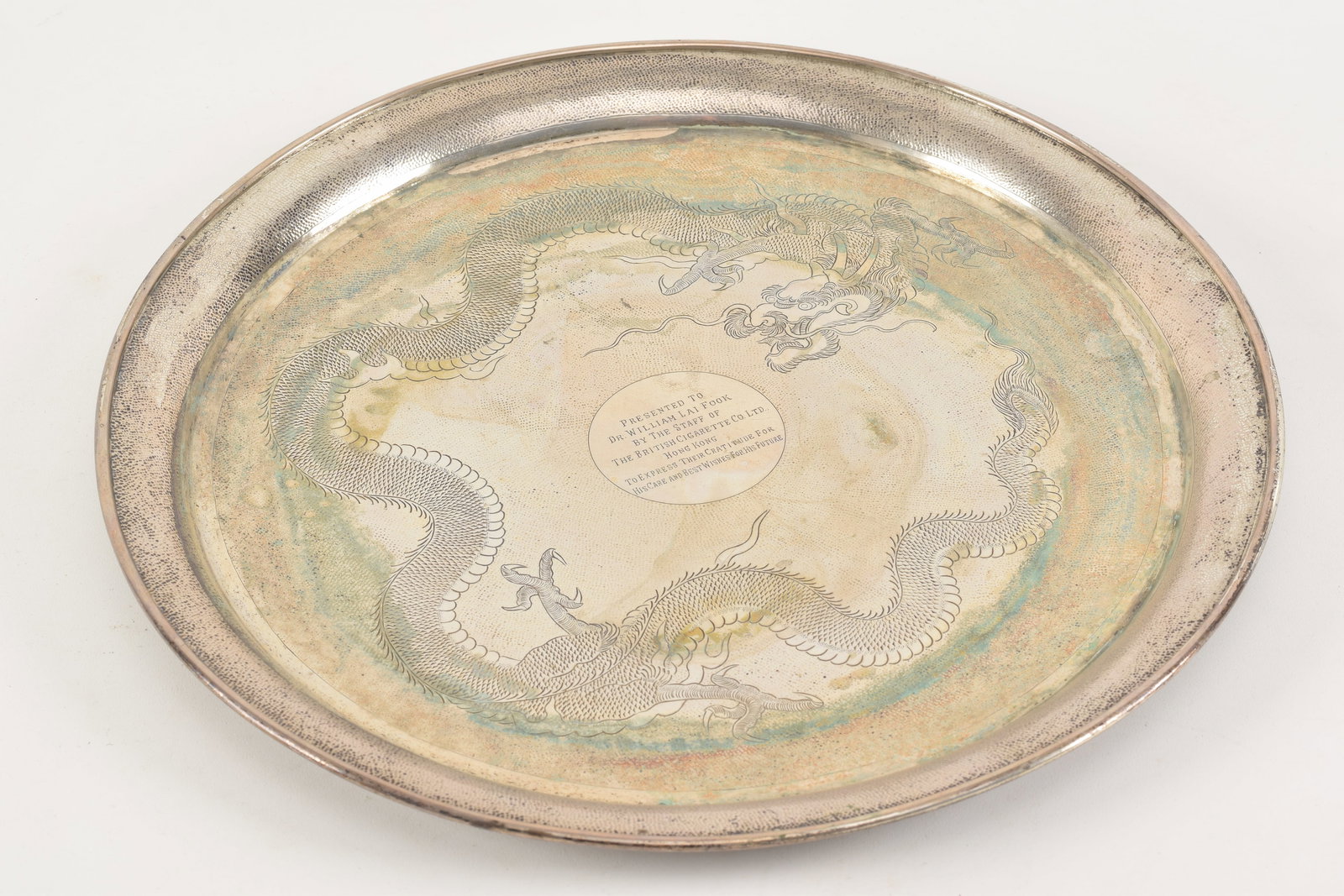 Chinese export silver tray. Early 20th century. Decoration of dragons on a textured ground. (1 of 6)
