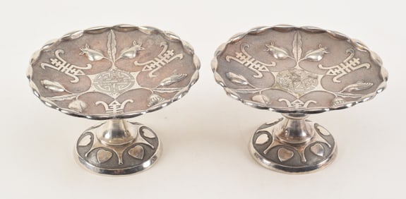 Pair of Chinese export silver tazzas. Repousse decoration of the three fruits: pomegranate, citron,