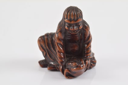 Carved wooden netsuke. Japan. 19th century. Gama sennin and his magical toad. 4.5cm.