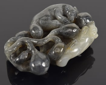 Jade pendant. China. 19th century. Chih lung in black and white jade. 2in length.
