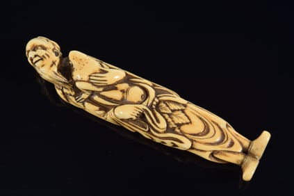 Netsuke. Japan. 18th century. Gamma sennin with toad. 10.5cm.