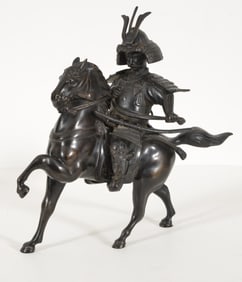 Bronze figure. Japan. Early 20th century. Okimono of a samurai on horseback. 15 x 16in.