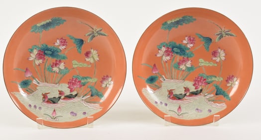Pair of porcelain bowls. China. 20th century. Orange ground with famille rose lotus and ducks. Kuang