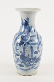 Porcelain vase. China. 19th century. Underglaze blue decoration of fish and aquatic plants. 17.5in