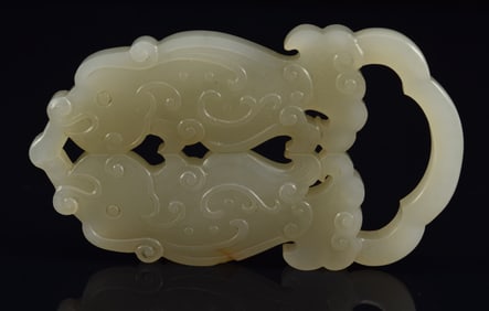 Jade carving. China. 18th century. Double fish pendant. 2.75in.
