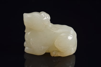 Jade celestial ram. China. 18th century. Pure white stone. 1.75in.