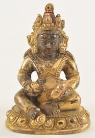 Gilt bronze image of Jambala, the god of wealth. China. 18th century. 2.25in high.