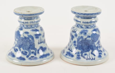 Pair of porcelain pricket holders. China. 19th/early 20th century. Underglaze blue decoration of