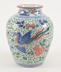 Porcelain vase. China. 19th century. Transitional Wu Tsai decoration of phoenixes and peonies in