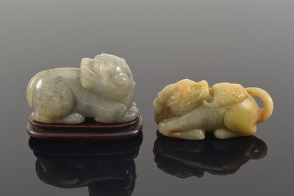 2 jade animals. China. 19th/20th century. A one horn and a two horn chih lung. Each 3.5in.
