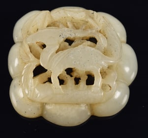 Jade pendant. China. Yuan period, 13th century. Deer in a forest scene. 1.75in.