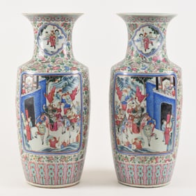 Pair of porcelain vases. China. 19th century. Famille rose decoration of historical scenes on a