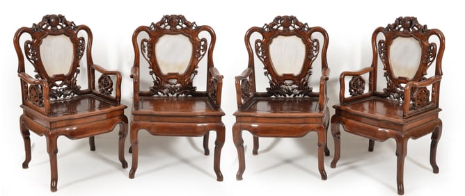 Set of 4 carved rosewood chairs inset with marble plaques. China. Early 20th century.