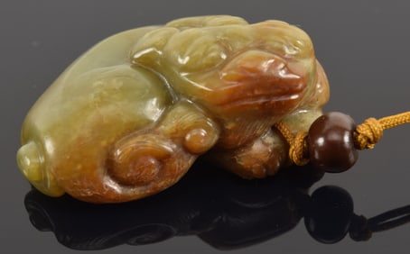 Jade foo dog. China. 19th century. 1.75in.