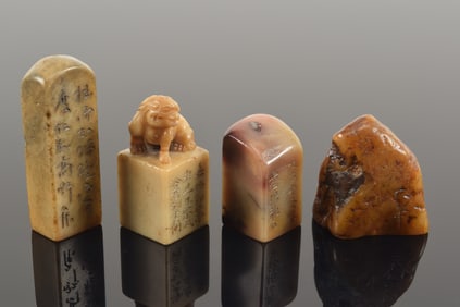 4 soapstone seals. China. 19th century. Largest 2.5in.