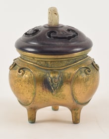 Gilt bronze censer. China. 18th century. Lobated with ju-i shaped panels and elephant heads. Carved
