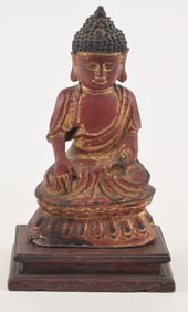 Bronze image of Amida buddha. China. Ming period (1368-1644). Lacquered surface and stand. Overall