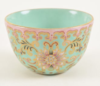 Porcelain wine cup. China. Chien Lung mark and of the period. Turquoise ground with floral scrolling