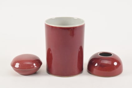 3 copper red desk articles. China. 19th/20th century. To include: a straight sided brush pot, small