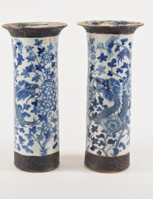 Pair of porcelain vases. China. Late 19th century. Ku beaker shape. Decoration of dragons and