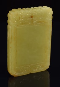 Yellow jade rectangular pendant. China. 18th century. 2.5in length.